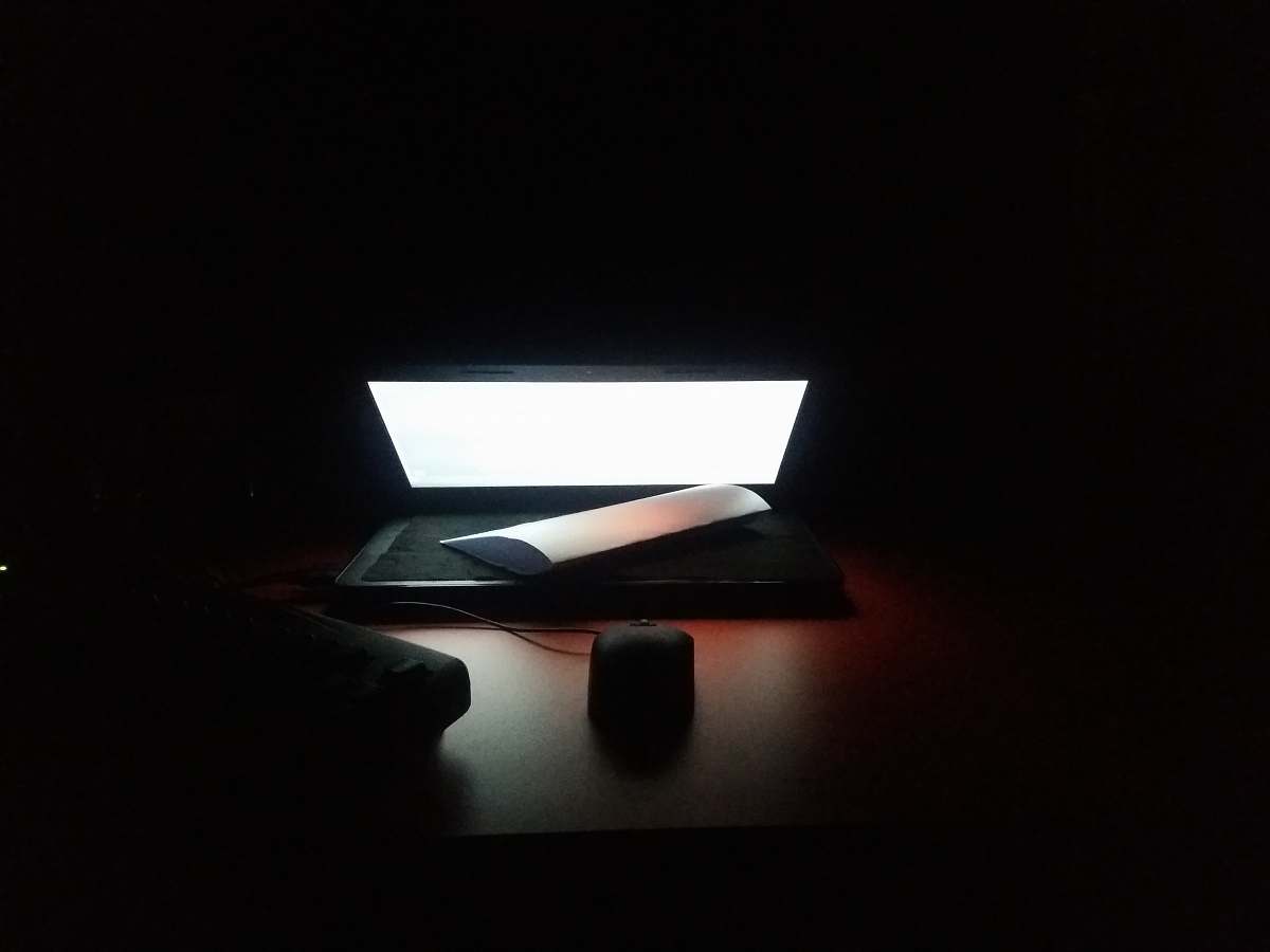 new delhi photo of turned on laptop computer on brown table india